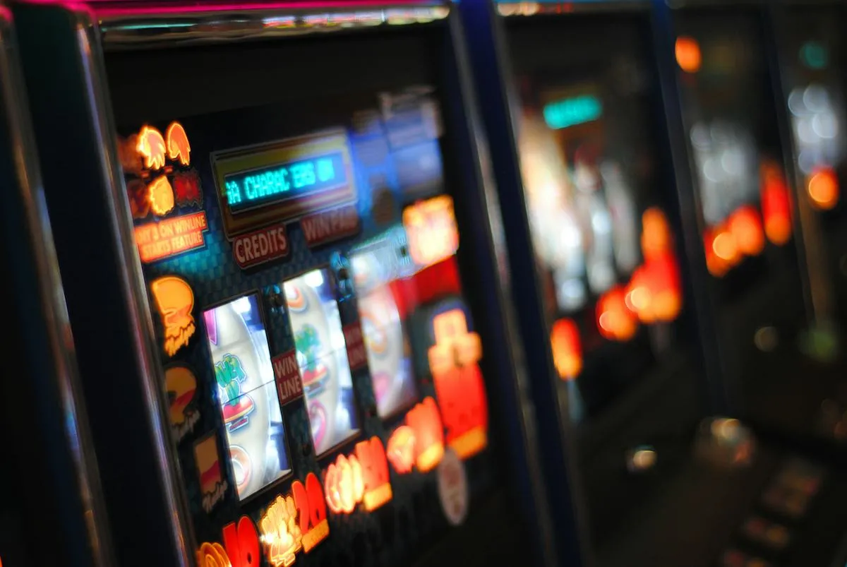 Casino game pieces under low lighting