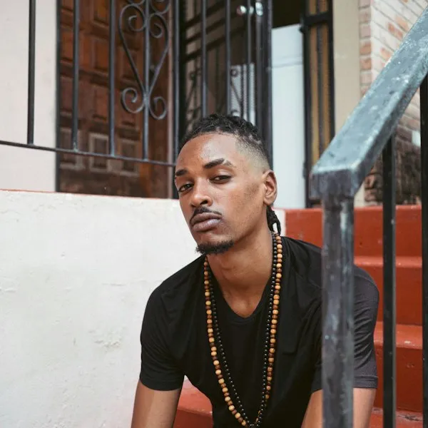 Illustrative portrait of a person in a street setting